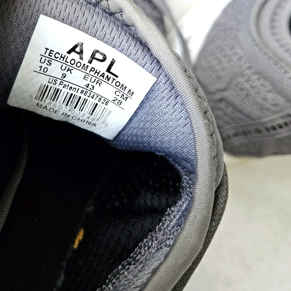 APL Phantom gray running shoes speckle soles